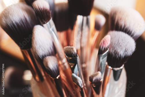 Set of makeup brushes on table, closeup