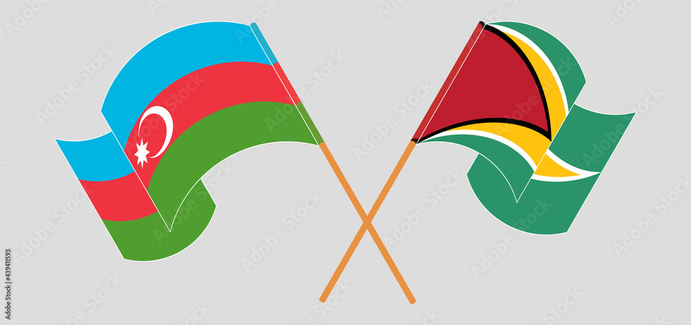 Crossed and waving flags of Azerbaijan and Guyana Crossed and waving flags of Azerbaijan and Guyana
