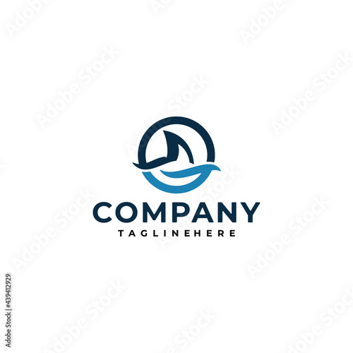 Minimalist Shark Fin on the Waves Logo Design