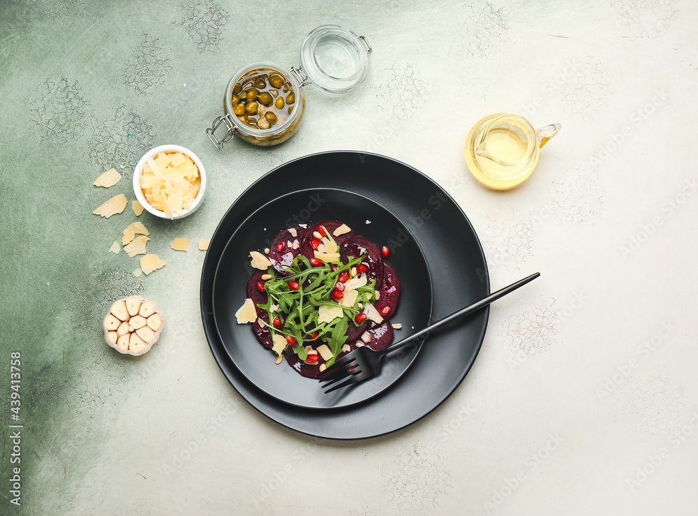 Composition with delicious beetroot carpaccio on color background