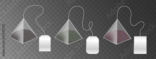 Tea bag pyramid shape isolated on transparent background. Realistic 3d teabags with empty label
