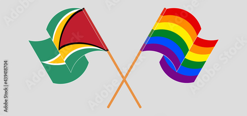 Crossed and waving flags of Guyana and LGBTQ