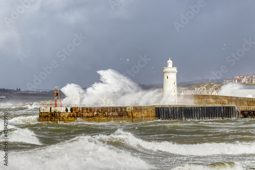 Buckie Harbour in rough sea photo