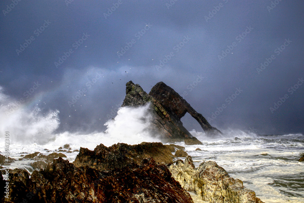 Bow Fiddle Rock in the storm, Portknockie, Moray Firth, Scotland Bow Fiddle Rock in the storm, Portknockie, Moray Firth, Scotland