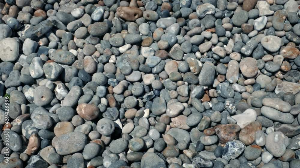 Moving Over Countless Beach Pebbles Moving Over Countless Beach Pebbles