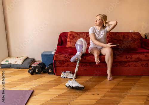 Person With Disability Sitting On The Couch photo