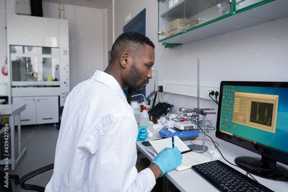 Scientist Working With Computer Scientist Working With Computer