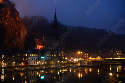 Small Belgian town Dinant on Meuse river in Walloon, Belgium at night