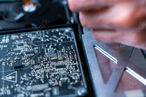 Computer technology. Electronic hardware repair, pc service and maintenance from technician engineer man. Digital chip equipment support.