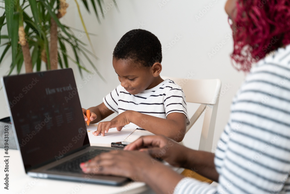 Boy drawing at home Boy drawing at home
