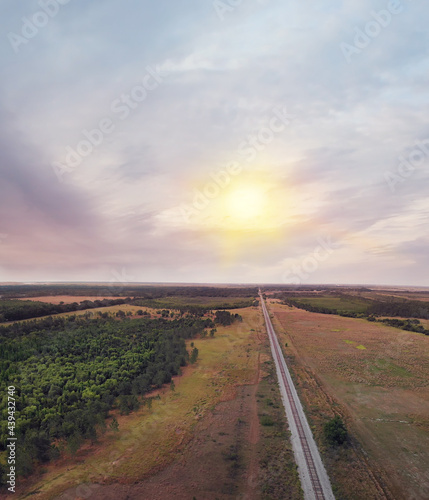 Railroad in a rural Florida area. Aerial landscape.