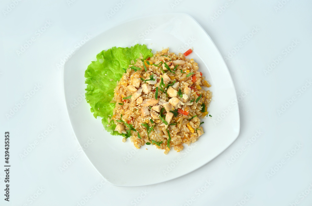 Plate of noodles with meat and vegetables isolated on white background, top view Plate of noodles with meat and vegetables isolated on white background, top view