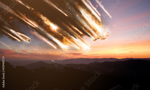 Fire trail meteorites approaching Earth photo