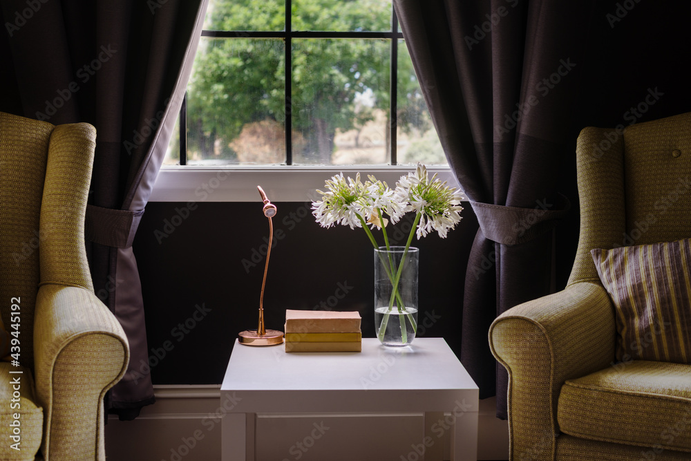 © Gillian Vann/Stocksy - sitting chairs with coffee table