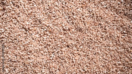 Raw broken dried Matta red parboiled rice photo