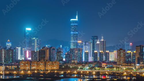 Skyline of Shenzhen City  China at twilight. Viewed from Hong Kong border