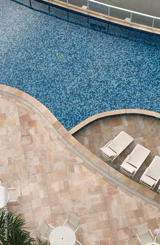 A top view of an empty outdoor hotel pool photo