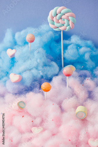 sweet magical landscape of cotton candy and lollipop photo