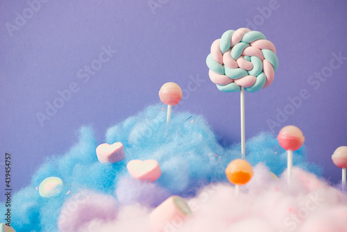 Sweet purple lollipop candy world photo