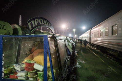 Food stall in a stop of the trans siberian train at night. photo