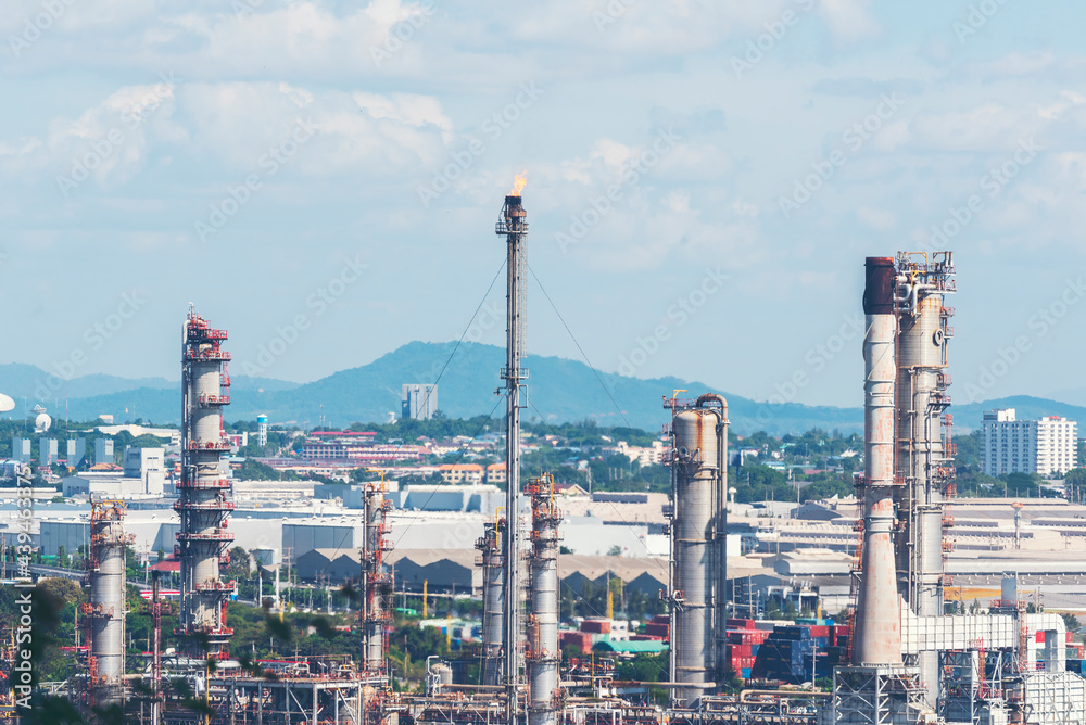 Fototapeta premium Oil refinery gas petrol plant industry with crude tank, gasoline supply and chemical factory. Petroleum barrel fuel heavy industry oil refinery manufacturing factory plant. Refinery industry concept