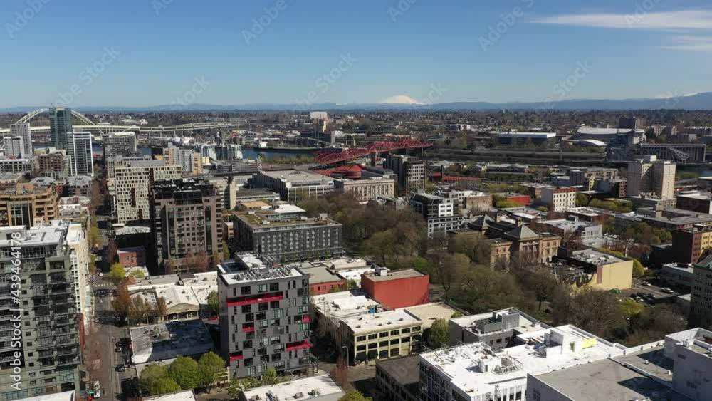 Cinematic drone trucking shot of Portland Pearl and Lloyd Districts, Nob Hill, Buckman Neighborhood, King's Heights, Willamette River, Tom McCall Waterfront Park, skyscrapers and cityscape in Oregon Cinematic drone trucking shot of Portland Pearl and Lloyd Districts, Nob Hill, Buckman Neighborhood, King's Heights, Willamette River, Tom McCall Waterfront Park, skyscrapers and cityscape in Oregon