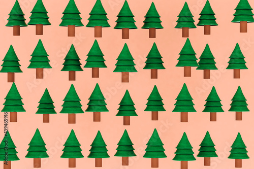 Illustration of pine trees on brownish background