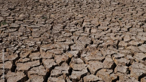 Drought-cracked soils, dry-cracked lakes, drought soil at river bottom. Ecosystems caused by climate change. Drought concept.dried and cracked soils. thirst and desertification. slider dolly shooting