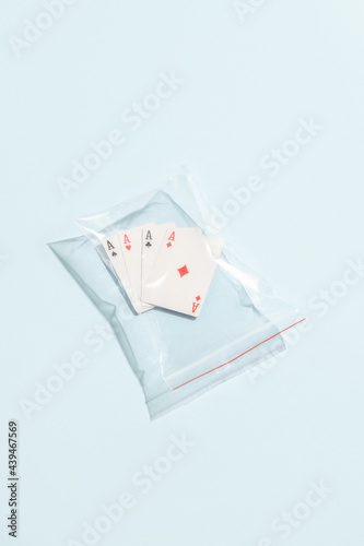 Four Aces In Plastic Bag. photo