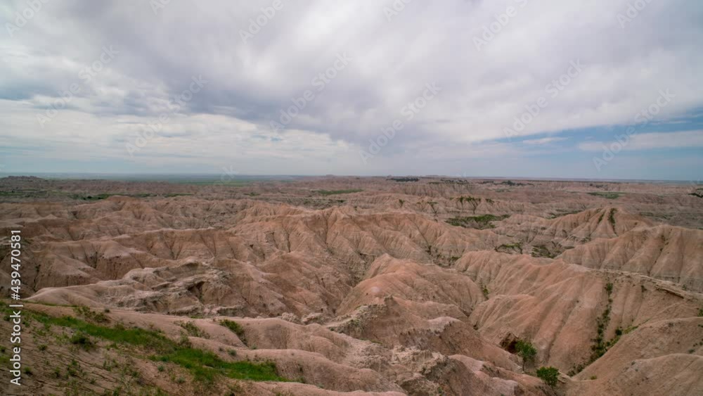 Timelapse over the South Dakota Badlands from lookout at the canyon rim as clouds move through the sky. Timelapse over the South Dakota Badlands from lookout at the canyon rim as clouds move through the sky.