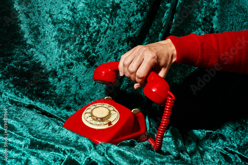 man picking up or hanging up the telephone