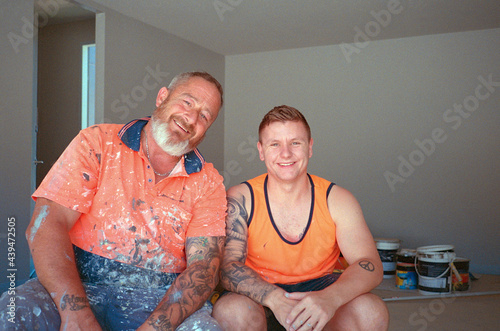 Father and son painting team
