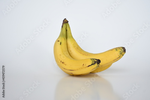 Yellow ripe bananas isolated white background