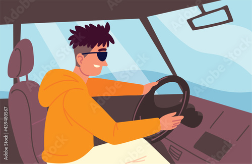 young driving a car