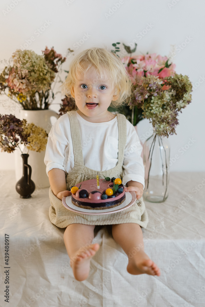 Girl in dress with birthday cake Stock Photo | Adobe Stock