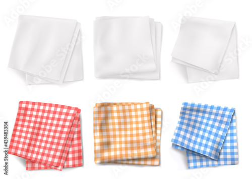 Gingham tablecloths and white kitchen towels top view. Vector realistic set of 3d folded table clothes with plaid pattern and linen napkins isolated on white background photo