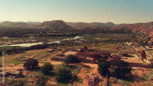 view of temple in beautiful scene with valley, river, and rock mountain