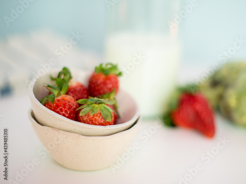 Ceramic bowls with strawberries photo