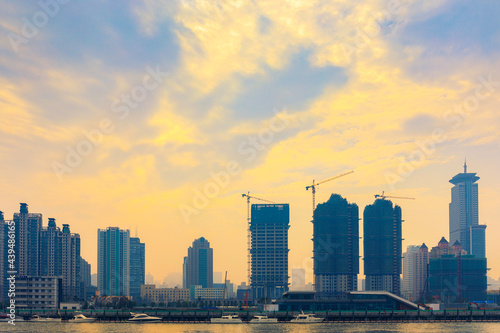 Shanghai city in sunny morning with cloud sky  misty and Huangpu river cityscape view