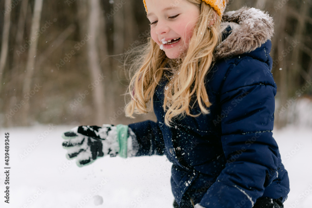 young girl playing in the snow young girl playing in the snow