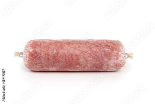 Ground frozen chicken sausage roll. Human grade raw meat inclusive back, neck, liver and heart. Concept for barf, raw food diet for cats, dogs and pets. Isolated on white.