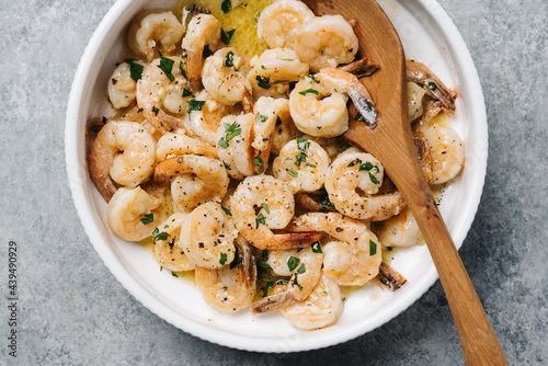 Shrimp scampi in a serving bowl photo