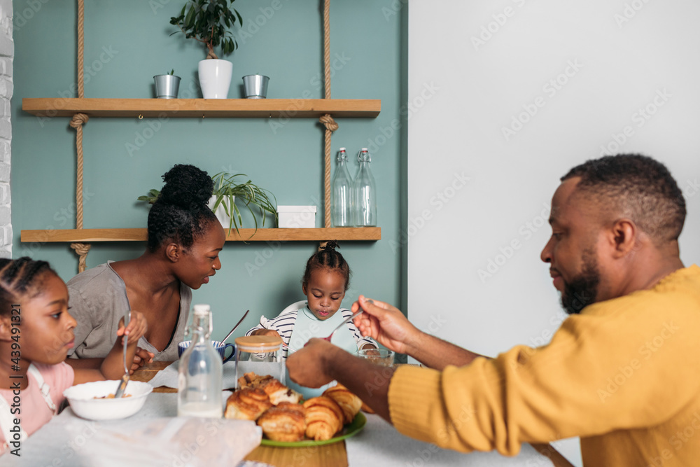 A Family Having Breakfast Together at Home A Family Having Breakfast Together at Home