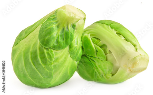 Brussel Sprouts heap isolated on white background. Fresh raw  brussels cabbage top view.