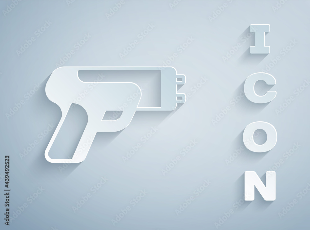 Paper cut Police electric shocker icon isolated on grey background. Shocker for protection. Taser is an electric weapon. Paper art style. Vector Paper cut Police electric shocker icon isolated on grey background. Shocker for protection. Taser is an electric weapon. Paper art style. Vector