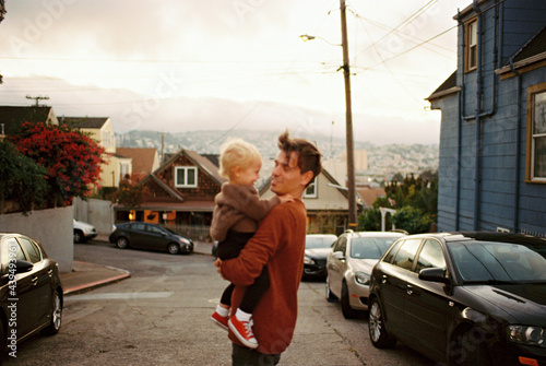 unsharp film image of father and son on a road in san francisco