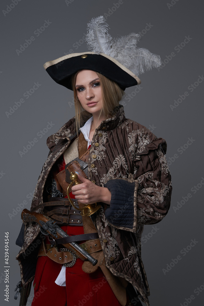 Fototapeta premium Woman corsair captain with hat and handgun