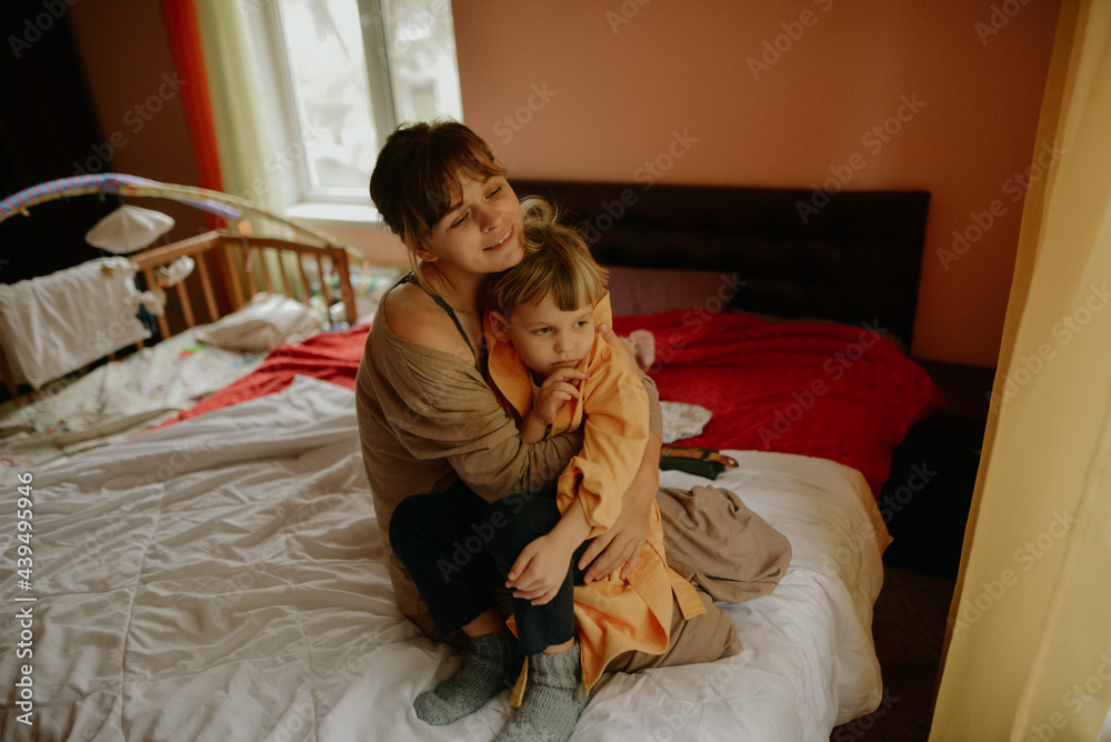 Young woman and her little son Young woman and her little son