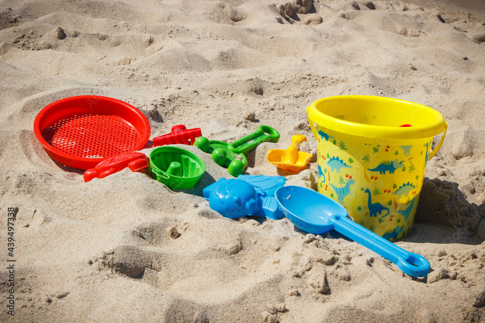 Children toys for relax or playing at beach. Summer, vacation time and child development Children toys for relax or playing at beach. Summer, vacation time and child development