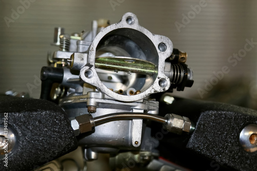 detail of a carburetor  photo